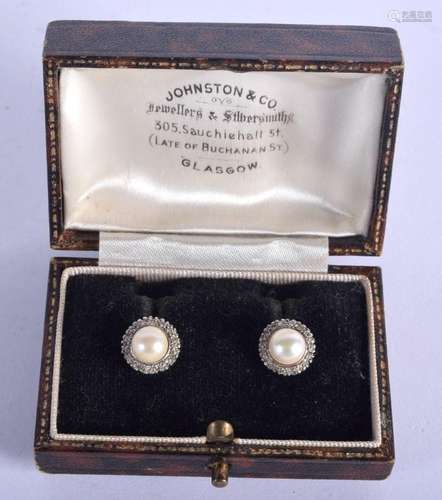 A PAIR OF EDWARDIAN WHITE METAL PEARL AND DIAMOND EARRINGS. ...