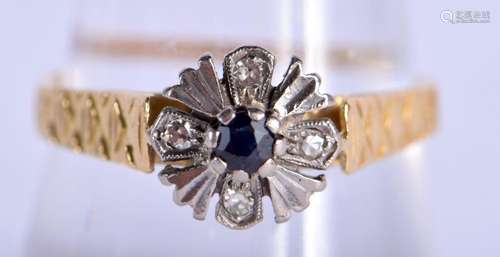 AN 18CT GOLD DIAMOND AND SAPPHIRE RING. 3.2 grams. Q.