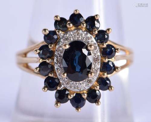 A 9CT GOLD DIAMOND AND SAPPHIRE RING. P/Q. 4 grams.