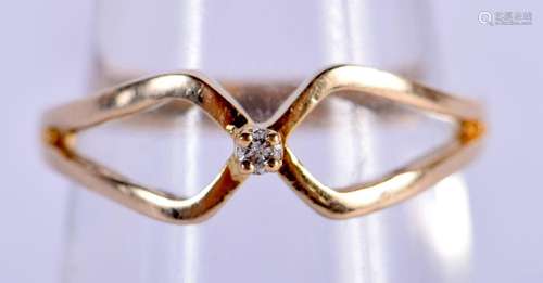 A 9CT GOLD AND DIAMOND RING. N. 2 grams.