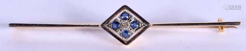 A 15CT GOLD DIAMOND AND SAPPHIRE BROOCH. 3.8 grams. 6 cm wid...