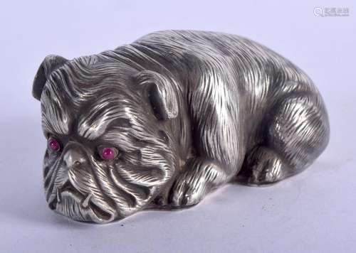 A CONTINENTAL SILVER AND RUBY FIGURE OF A DOG. 62 grams. 6.5...