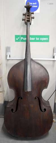 AN ANTIQUE GERMAN SINGLE PIECE BACK DOUBLE BASS with scrolli...