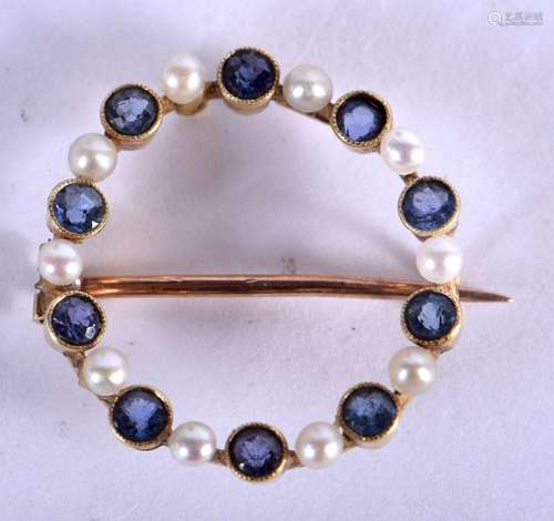 AN ANTIQUE 15CT GOLD SEED PEARL AND SAPPHIRE BROOCH. 2.3 gra...