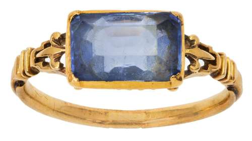 An early 19th century gold and sapphire ring, centering on a...