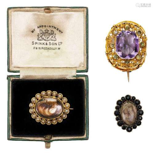 Three brooches, comprising: a gold and amethyst brooch, c.18...