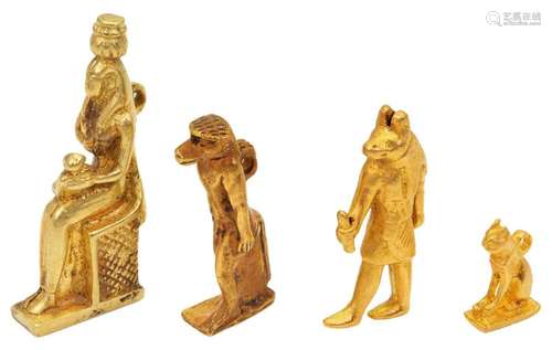 Four Egyptian reproduction miniature figures, depicting the ...