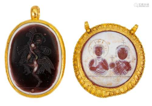 Two intaglio pendants, comprising: a circular hardstone inta...