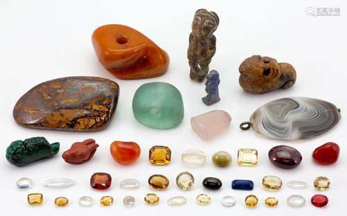 A group of gem stones and reproduction antique figures, gems...