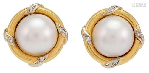 A pair of mabe cultured pearl and diamond earclips, each cen...