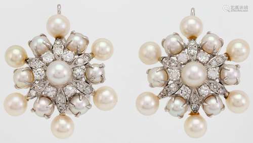 A pair of diamond and cultured pearl earrings, each of flowe...