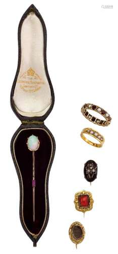 A group of jewellery, comprising: an opal single stone stick...