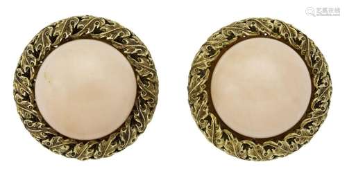 A pair of coral earclips, by Buccellati, the bouton shaped c...