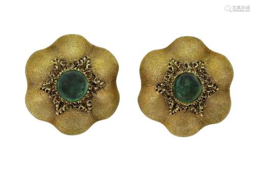 A pair of emerald earclips by Buccellati, each of textured s...