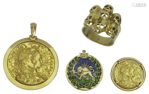 A group of jewellery, comprising: a circular pendant and dre...