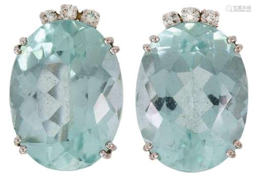 A pair of aquamarine and diamond earrings, each claw set wit...