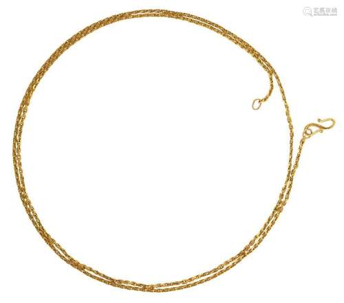 A gold fancy figure-of-eight link necklace, clasp stamped 22...