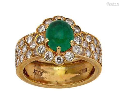 An Emerald and diamond ring, centring on an emerald and diam...