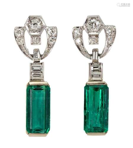 A pair of emerald and diamond earrings, each supporting a re...