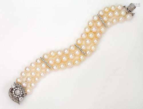 Cultured pearl bracelet, composed of three rows of uniform c...