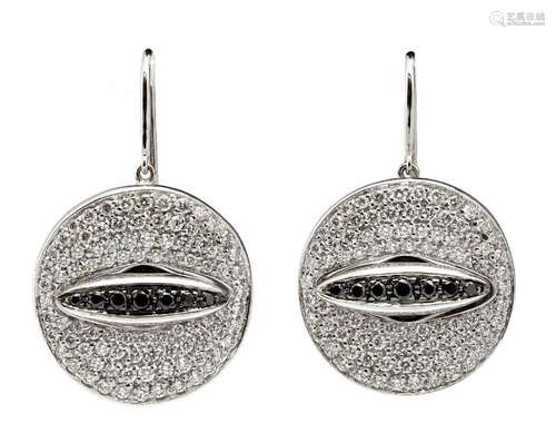 A pair of diamond earrings, Gavello, each of circular design...