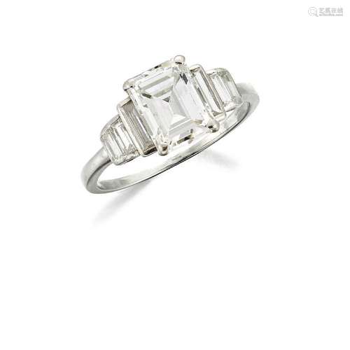 A diamond single stone ring, claw set with a rectangular-cut...