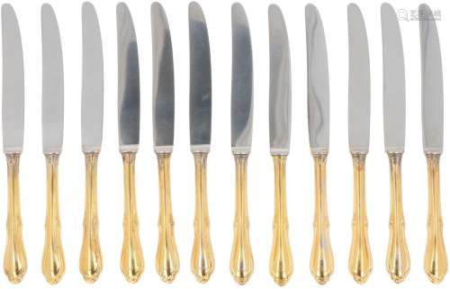 (12) piece set of fruit knives gilded silver.