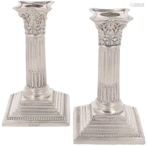 (2) piece set of table candlesticks silver.