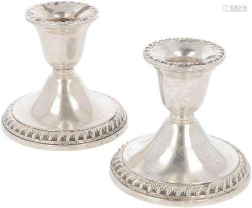 (2) piece set of table candlesticks silver.