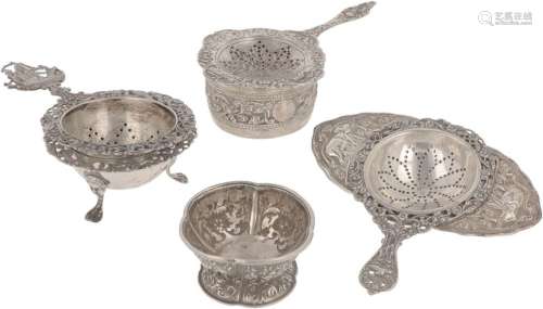 (7) piece lot of silver tea strainers and drip trays.
