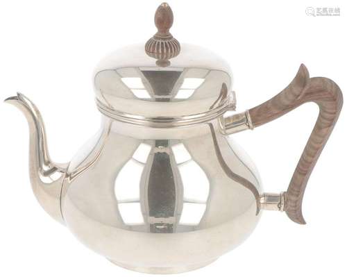 Silver teapot.