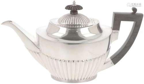 Silver teapot.