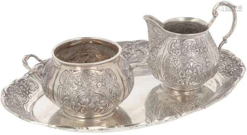 (3) piece silver creamer set.