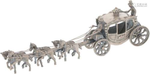 Miniature royal carriage with six horses in silver.