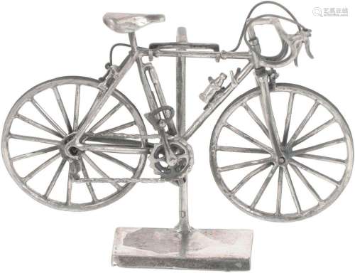 Miniature racing bike with standard silver.