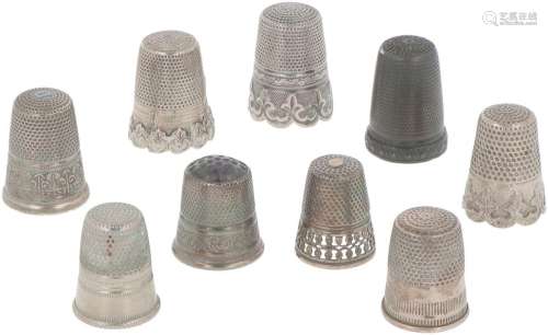 (9) piece lot of silver thimbles.