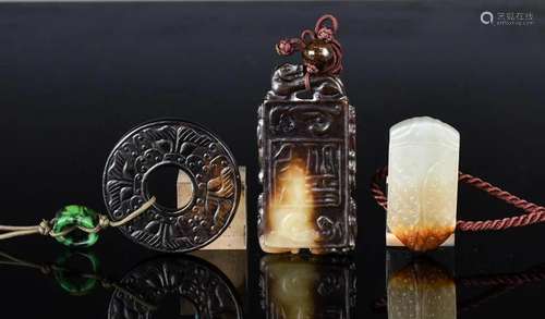 A Group of Three Chinese Jade Carved Pendants