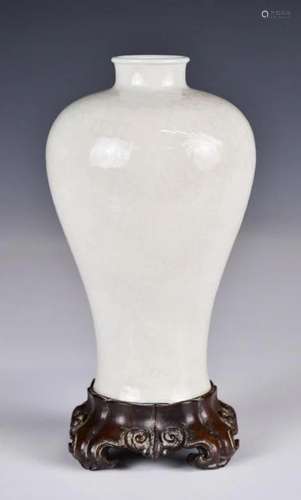 A Small White Glazed Incised Mei Vase Qing