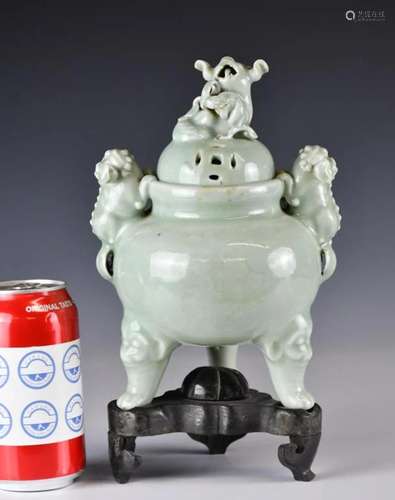 A Chinese Celadon Glazed Tripod Censer, Qing