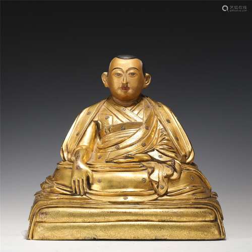 A Tibetan Gilt-bronze Figure of Guru