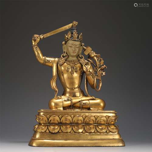 A Tibetan Bronze-gilt Seated Manjusri