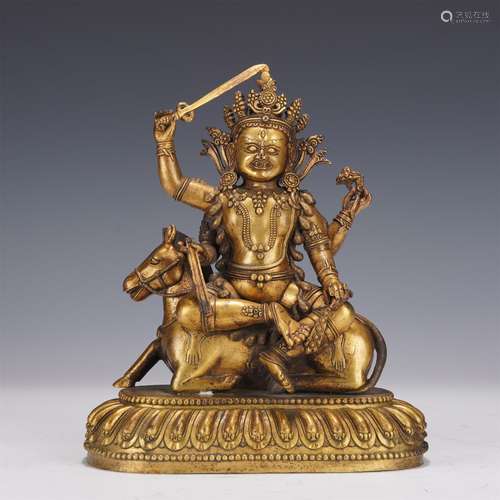 A Gilt Bronze Jambhala