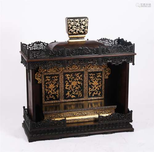 A Carved Rosewood and Gold Painted Niche