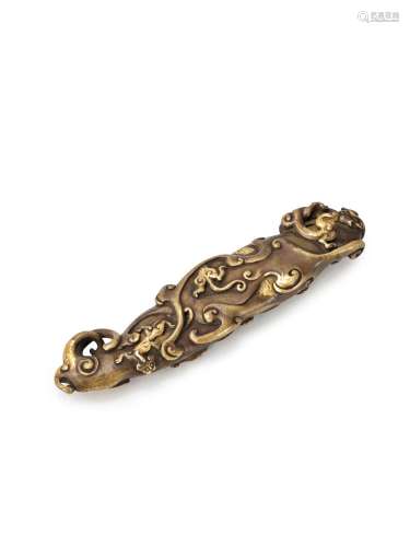 A rare Imperial gold-splashed bronze 'chilong' scroll weight