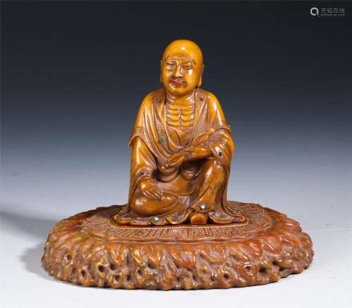 A Carved Soapstone Seated Arhat