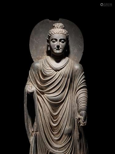 A SCHIST FIGURE OF BUDDHA