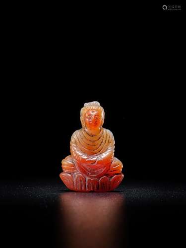 A CARNELIAN FIGURE OF BUDDHA