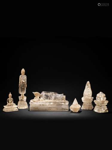 A GROUP OF SIX CARVED ROCK CRYSTAL BUDDHIST SCULPTURES