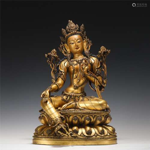 A Tibetan Gilt-bronze Figure of Green Tara