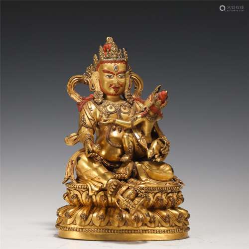 A Tibetan Gilt-bronze Figure of Jambhala